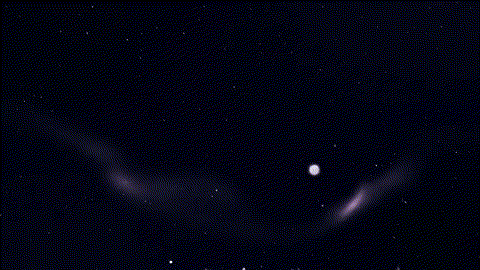 An animated background of a slow-moving cosmic nebula.